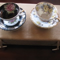  Two teacups, the left on 3 little legs, arrived 1/25/11 from artist, Susan knight (susanknightart.com)