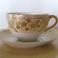 One teacup with gold filigree from anonymous 
